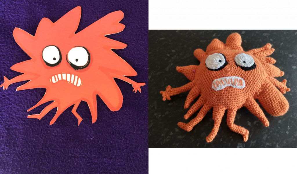 A drawing of a splat like figure in orange, wearing a look of surprise that he has splatted. The crochet toy of the drawing is on the right.