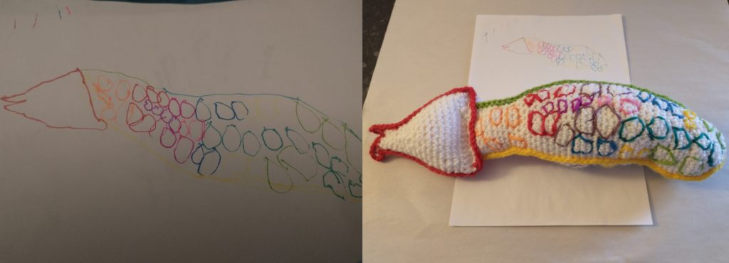 A young child's drawing of a white creature with multicoloured spots on it and the same creature in crochet toy form on the right