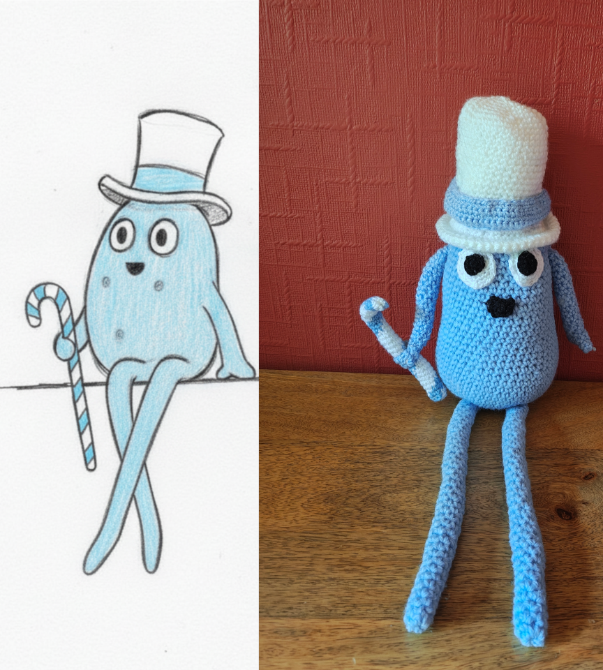 A drawing of a blue potato like gentleman with long skinny blue legs, and skinny arms, sporting a white top hat with a blue band and sporting a candy cane striped in blue and white. He has a small black smile and white eyes with large round black pupils. On the right is the crochet version which is looking up at the camera.